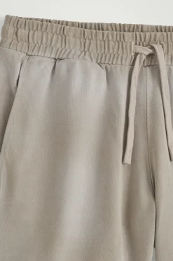 Fashion COS ŚCIĄGANE W TALII SZORTY ZE SPRANEGO DŻERSEJU Szarobrązowy
