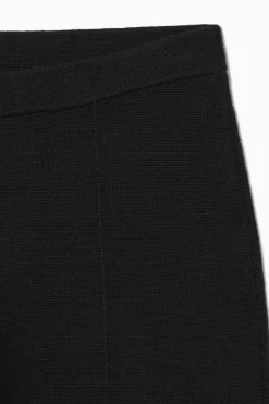 Online COS DZIANINOWE SPODNIE TYPU SLIM FIT