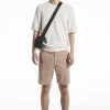 Fashion COS KLASYCZNE SZORTY TYPU CHINOS Opalonybeżowy