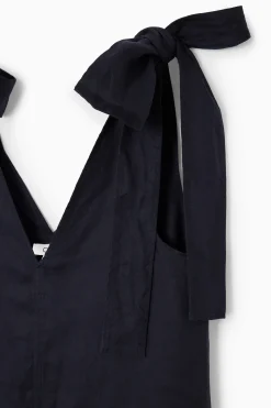 Fashion COS LNIANA SUKIENKA MIDI Z WIĄZANYMI RAMIĄCZKAMI