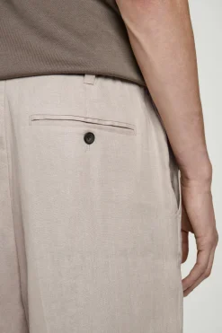 Discount COS LNIANE SPODNIE Z SZEROKIMI NOGAWKAMI Brązowoszary