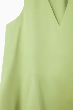 Clearance COS OBSZERNA SUKIENKA MAXI Z DEKOLTEM W SEREK