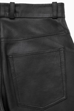 Sale COS ROZSZERZANE SKÓRZANE SPODNIE – SLIM FIT