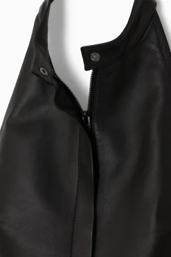 New COS SKÓRZANY MOTOCYKLOWY TOP Z MOCOWANIEM NA KARKU