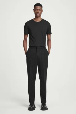 Clearance COS SPODNIE W PRĄŻKI Z ELASTYCZNĄ TALIĄ – RELAXED FIT