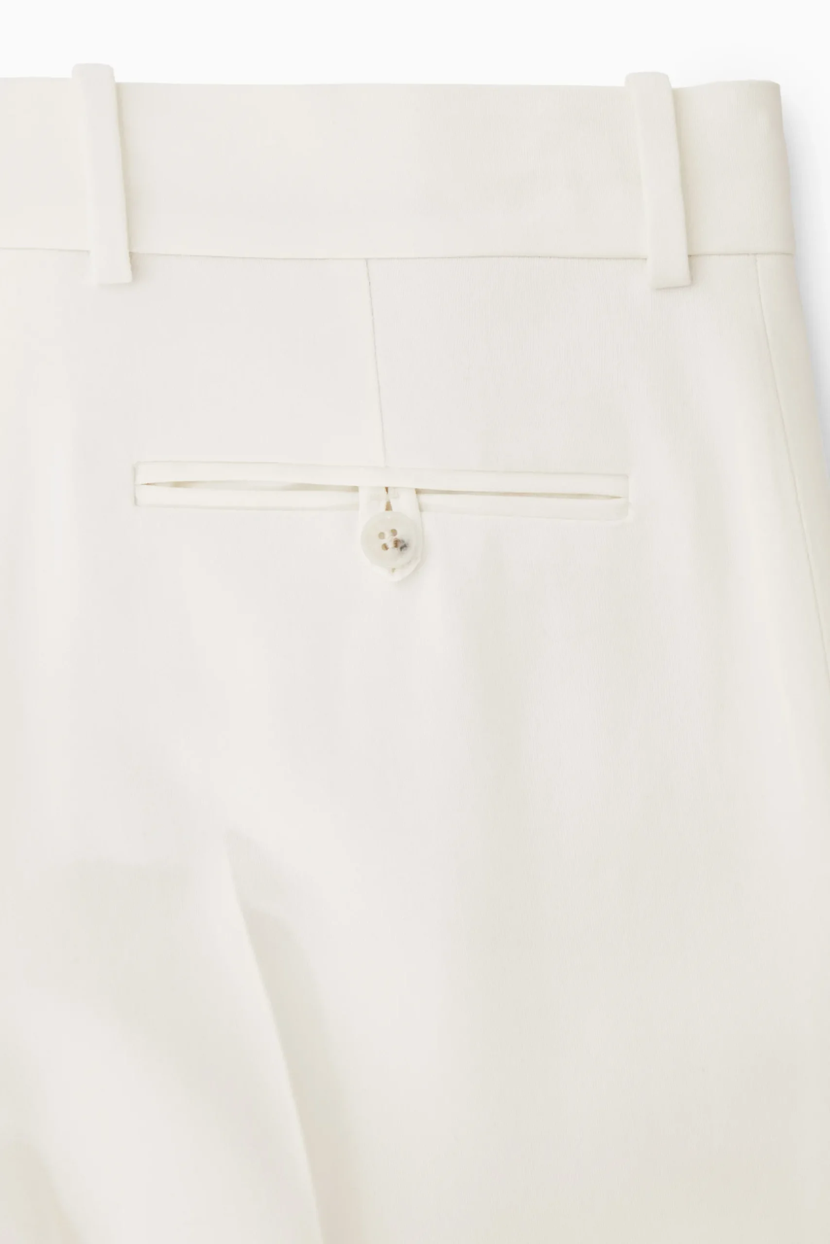 Clearance COS SPODNIE Z KREPY Z PROSTYMI NOGAWKAMI – RELAXED FIT