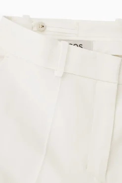 Clearance COS SPODNIE Z KREPY Z PROSTYMI NOGAWKAMI – RELAXED FIT