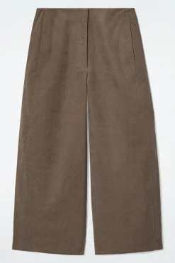 Clearance COS SZTRUKSOWE SPODNIE Z NOGAWKAMI TYPU BARREL