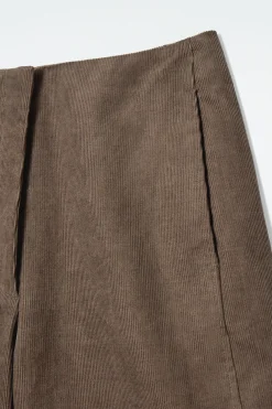 Clearance COS SZTRUKSOWE SPODNIE Z NOGAWKAMI TYPU BARREL