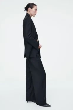 Clearance COS WEŁNIANE SPODNIE TYPU BARREL – RELAXED FIT