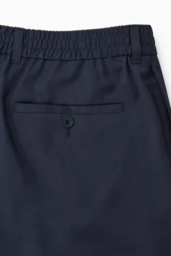 Fashion COS WEŁNIANE SPODNIE Z PROSTYMI NOGAWKAMI Granatowy