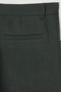Fashion COS WEŁNIANE SPODNIE ZE ZWĘŻANYMI NOGAWKAMI Ciemnozielony