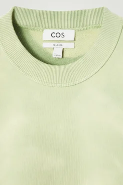 New COS BLUZA Z EFEKTEM ACID WASH Jasnozielony
