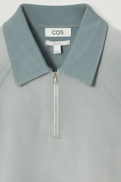 New COS KOSZULKA POLO Z ZAMKIEM I EFEKTEM SPRANIA Niebieski