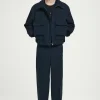 Sale COS SPODNIE CHINO Z NOGAWKAMI TYPU BARREL Granatowy